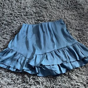 Silky blue skirt frill at the bottom